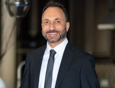 Kam Moshari -