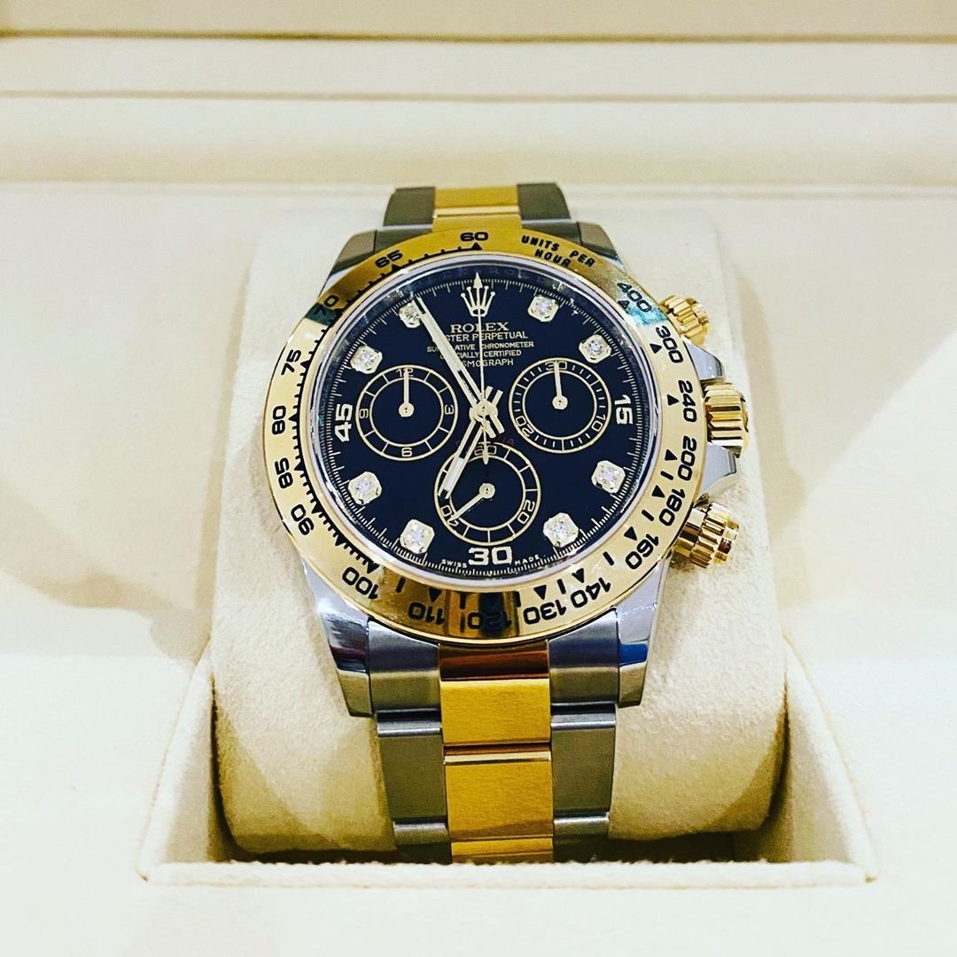 rolex daytona oystersteel and yellow gold