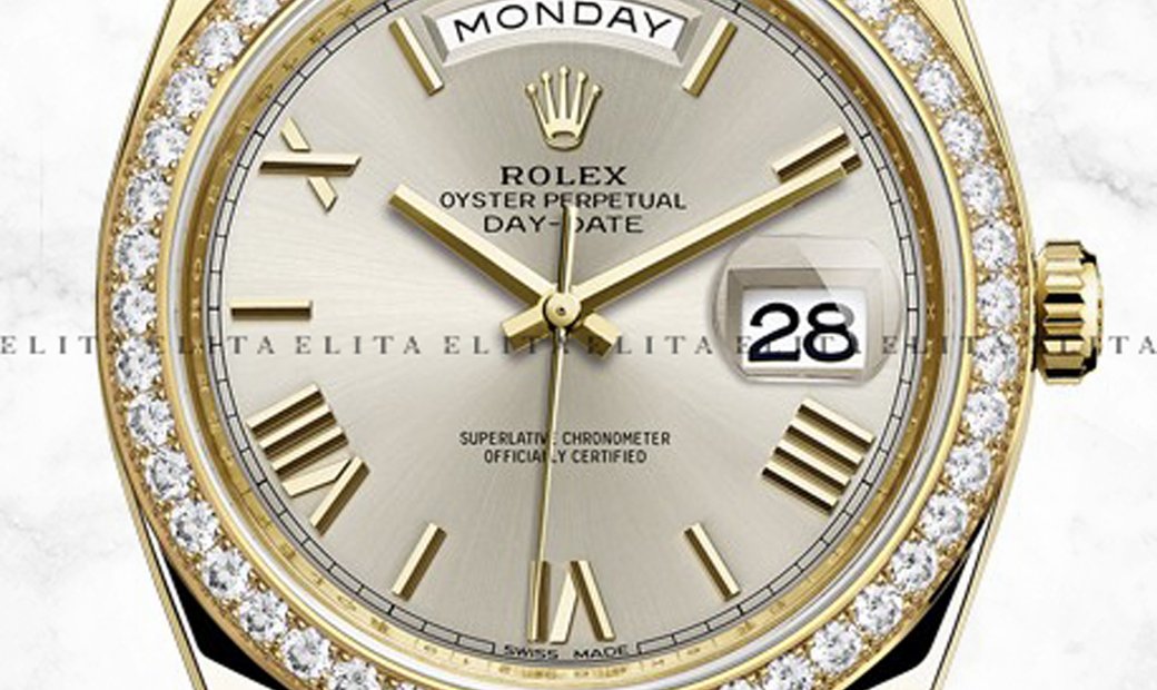 Rolex Day-Date 40 228348RBR-0007 18K Yellow Gold Silver Dial Diamond Set Bezel
