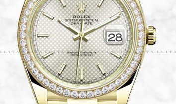 Rolex Day-Date 40 228348RBR-0005 18K Yellow Gold Silver Diagonal Motif Dial Diamond Set Bezel