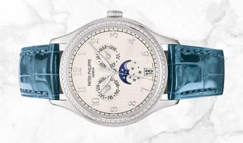 Patek Philippe Complications 4947G-010 Annual Calendar Moon Phases White Gold Silvery Dial
