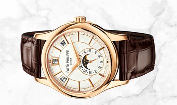 Patek Philippe Complications 5205R-001 Annual Calendar Moon Phases Rose Gold Opaline White Dial