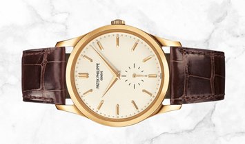 Patek Philippe Calatrava 5196J-001 Small Seconds in Yellow Gold Silvery Opaline Dial