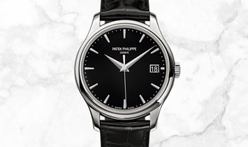 Patek Philippe Calatrava 5227G-010 Date Sweep Seconds in White Gold with Black Opaline Dial