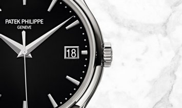 Patek Philippe Calatrava 5227G-010 Date Sweep Seconds in White Gold with Black Opaline Dial