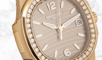 Patek Philippe Nautilus 7010/1R-012 Quartz Movement Date and Sweep Seconds Rose Gold Diamond Set