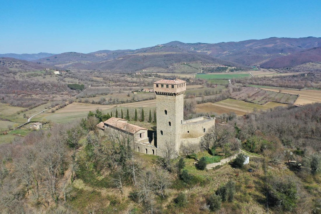 Torre D’Annibale: A Medieval Dream Awakens in Umbria’s Golden Light