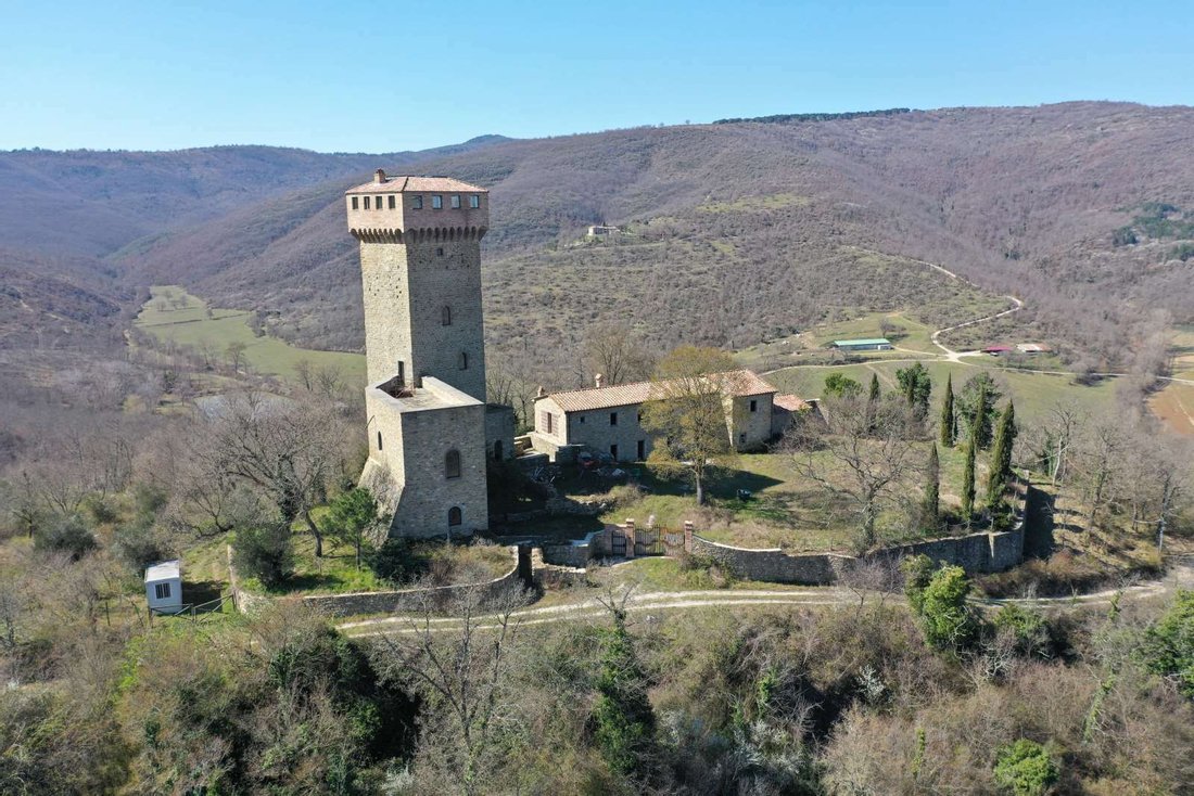Torre D’Annibale: A Medieval Dream Awakens in Umbria’s Golden Light