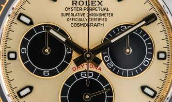 Rolex Daytona Cosmograph 116518LN-0048 Yellow Gold Champagne and Black Dial