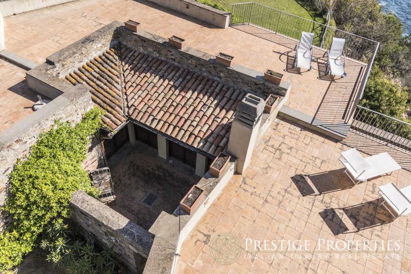 The Sentinel’s Retreat: A Tuscan Watchtower Whispering to the Sea