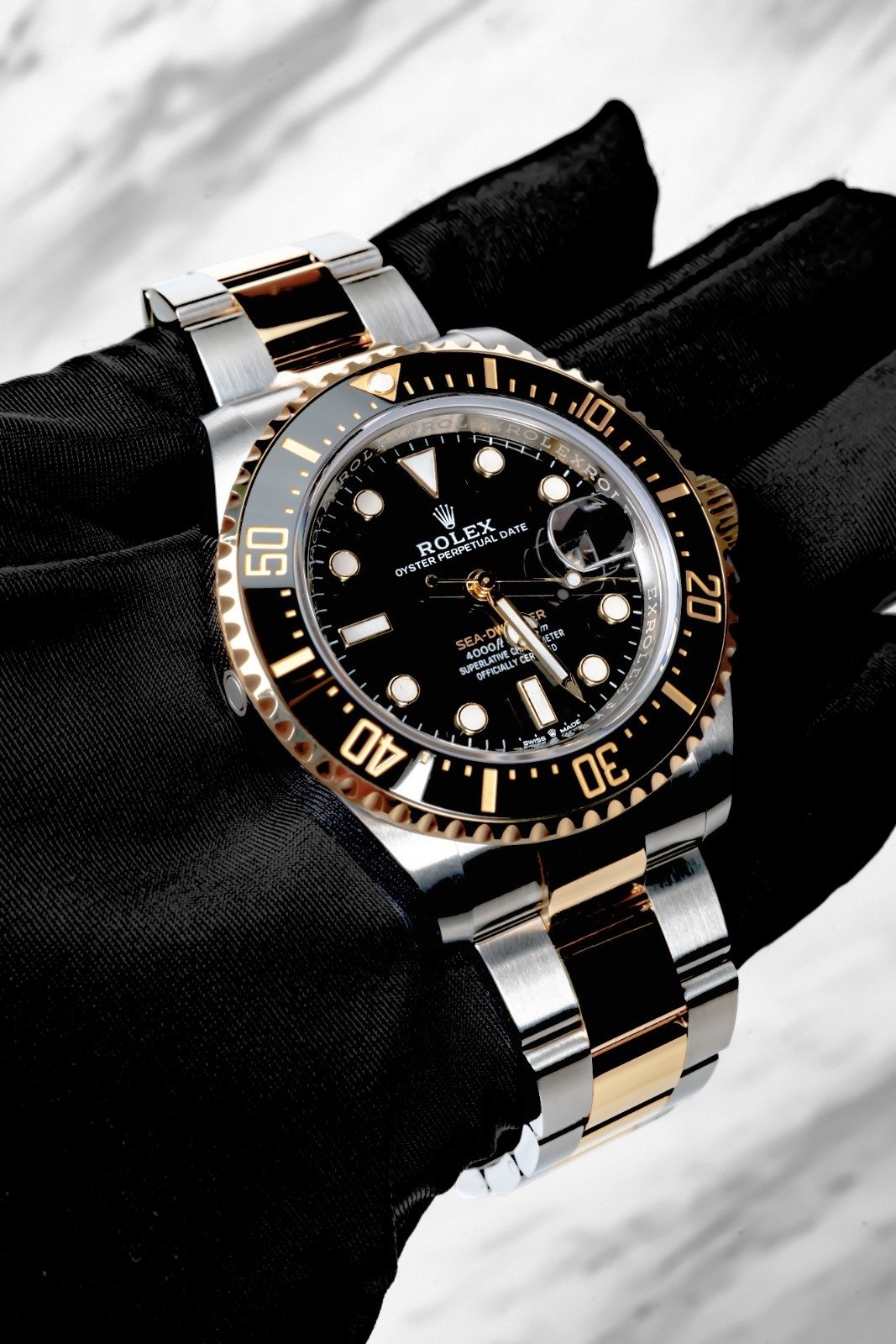 Rolex sea dweller gold price hot sale