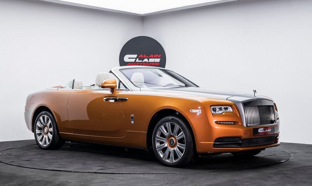 Rolls Royce Dawn. Роллс Ройс оранжевый. Роллс Ройс 2016. Rolls Royce Dawn диски.