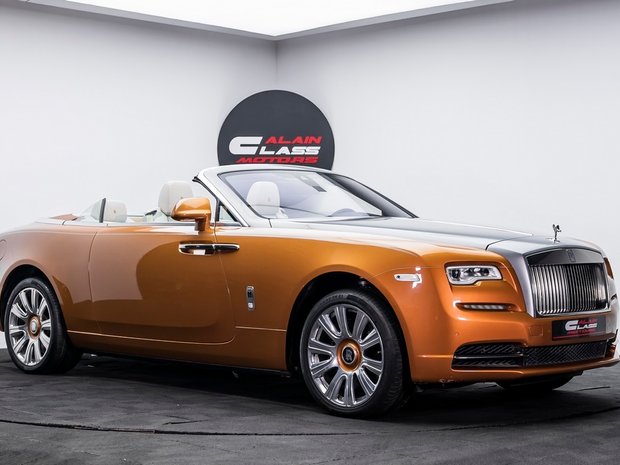 Orange headrests on a Rolls Royce Wraith with the RR Emblem Stock Photo   Alamy