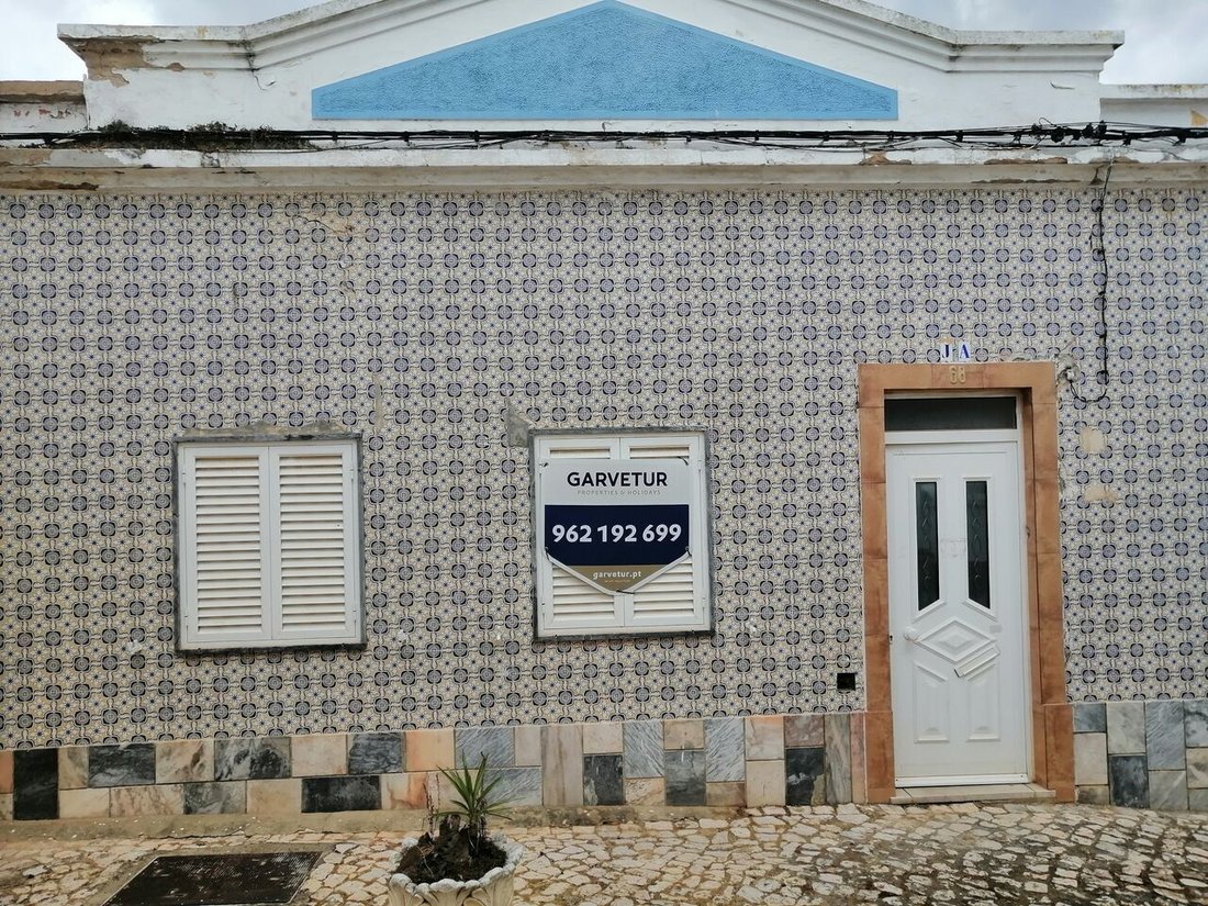 Typical House Next To The River Arade, In Ferragudo, Algarve, Portugal