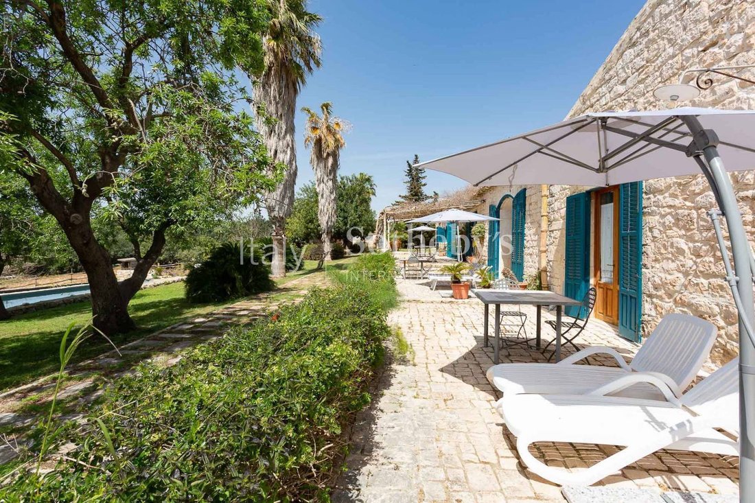 Farmhouse Surrounded By The Modican Countryside In Sicily, Italy For