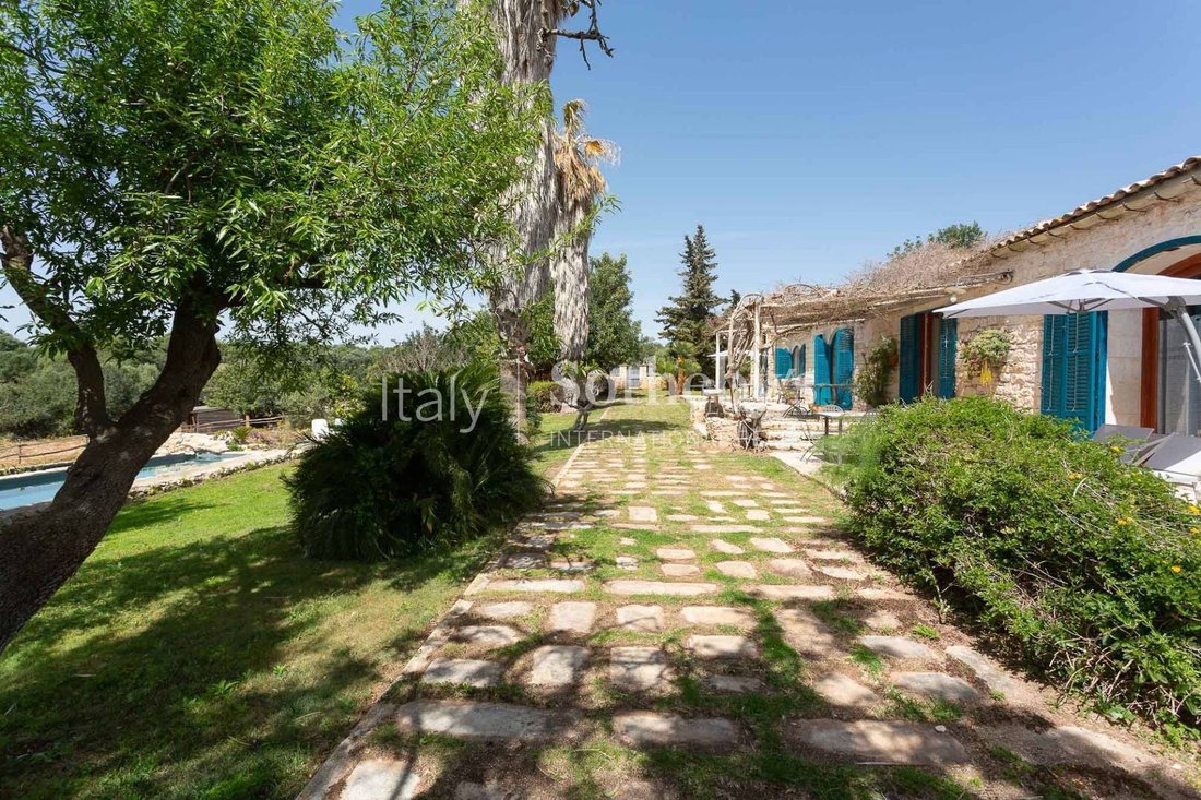 Farmhouse Surrounded By The Modican Countryside In Sicily, Italy For