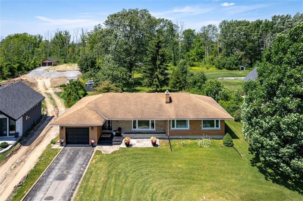 To This Charming Brick Bungalow! In Niagara Falls, Ontario
