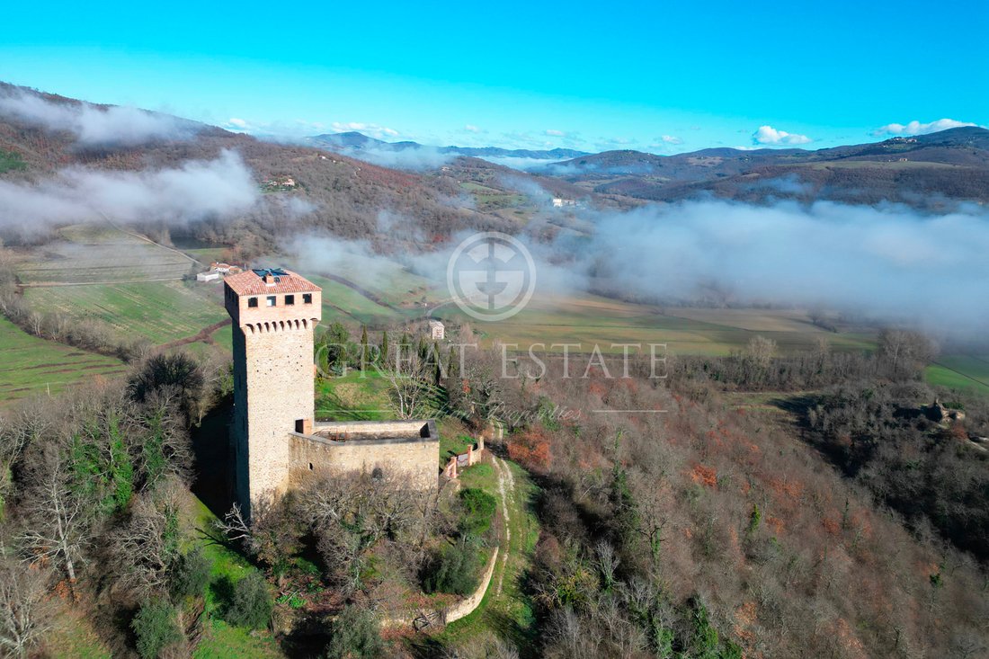 Whispers of Umbria: A Castle Crowned by Lake Trasimeno’s Golden Light - 5