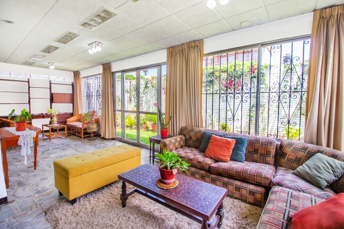 Great House In Corner In Front Of Park In In Lima, Callao Region, Peru