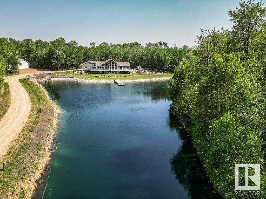 Immaculate Bungalow Surround By Lush Forest And In Tofield, Alberta