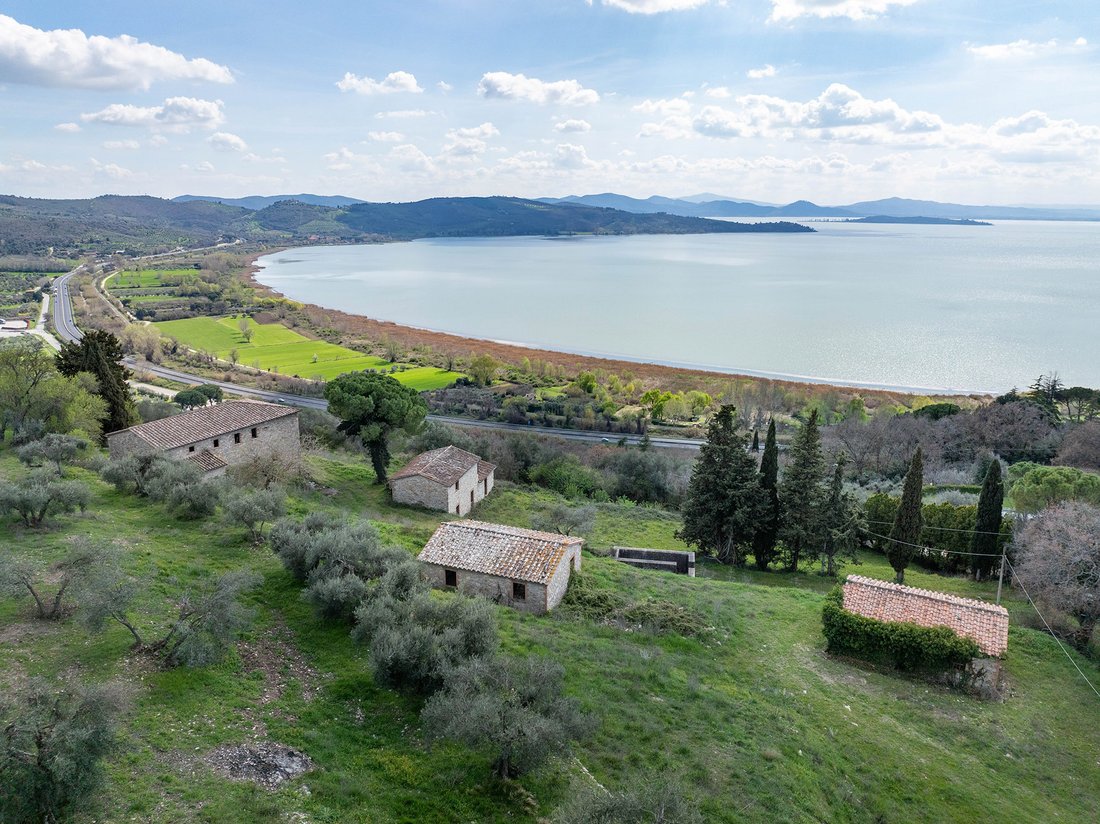 Whispers of the Middle Ages: A Lakeside Castle Crown in Umbria’s Golden Light