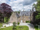 Perched In The Hills Of The Vire Valley, With 22 Hectares Of Land, A Listed Chateau From The