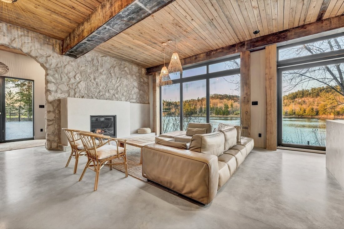Modern Elegance With Breathtaking River Backdrop In Alcove, Quebec