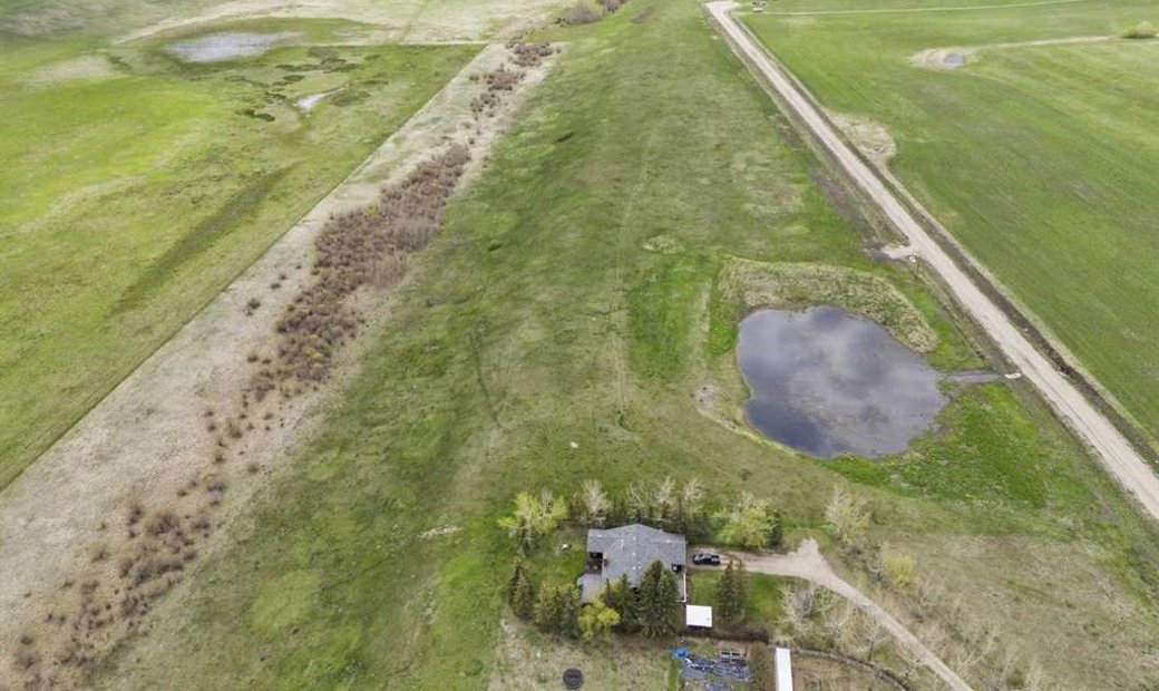 Renovated Craftsman Bungalow On Over 46 Acres In Aldersyde, Alberta