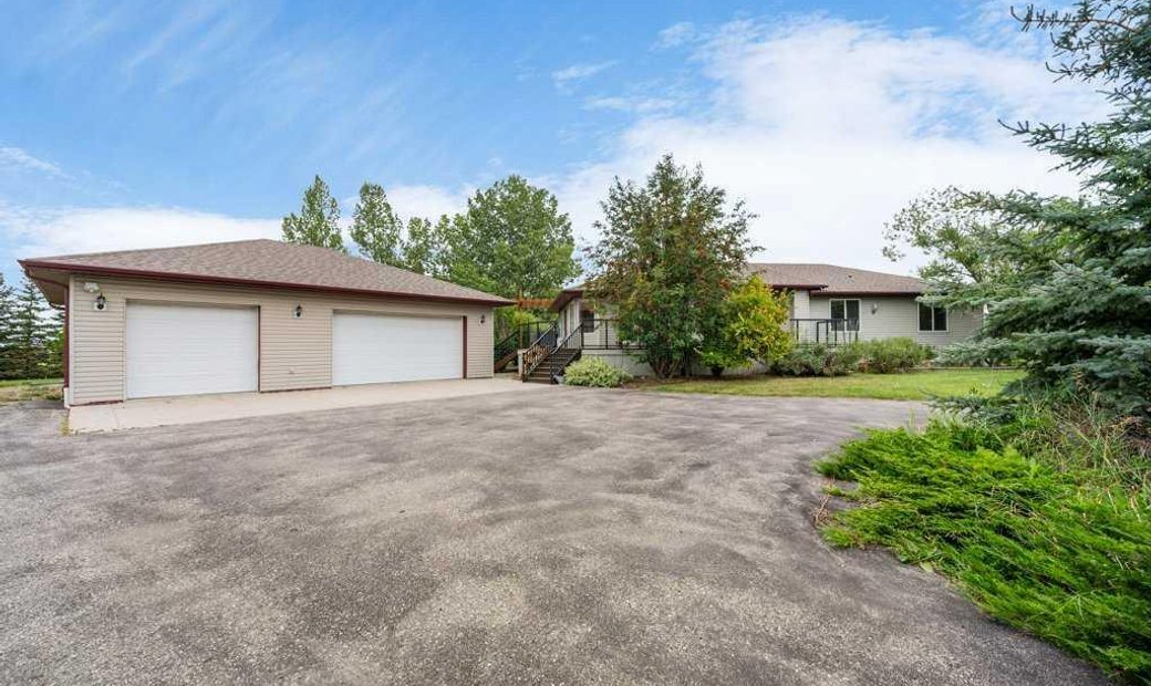 Meticulously Maintained Bungalow On Over Nine In De Winton, Alberta