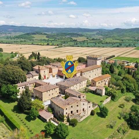 A Tuscan Crown: 1022 Castle & Vine-Kissed Dominion in Crete Senesi