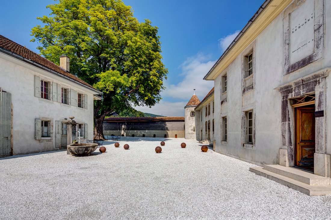 Le Rosey’s Timeless Embrace: A 13th-Century Château Crowned in Vine & Light