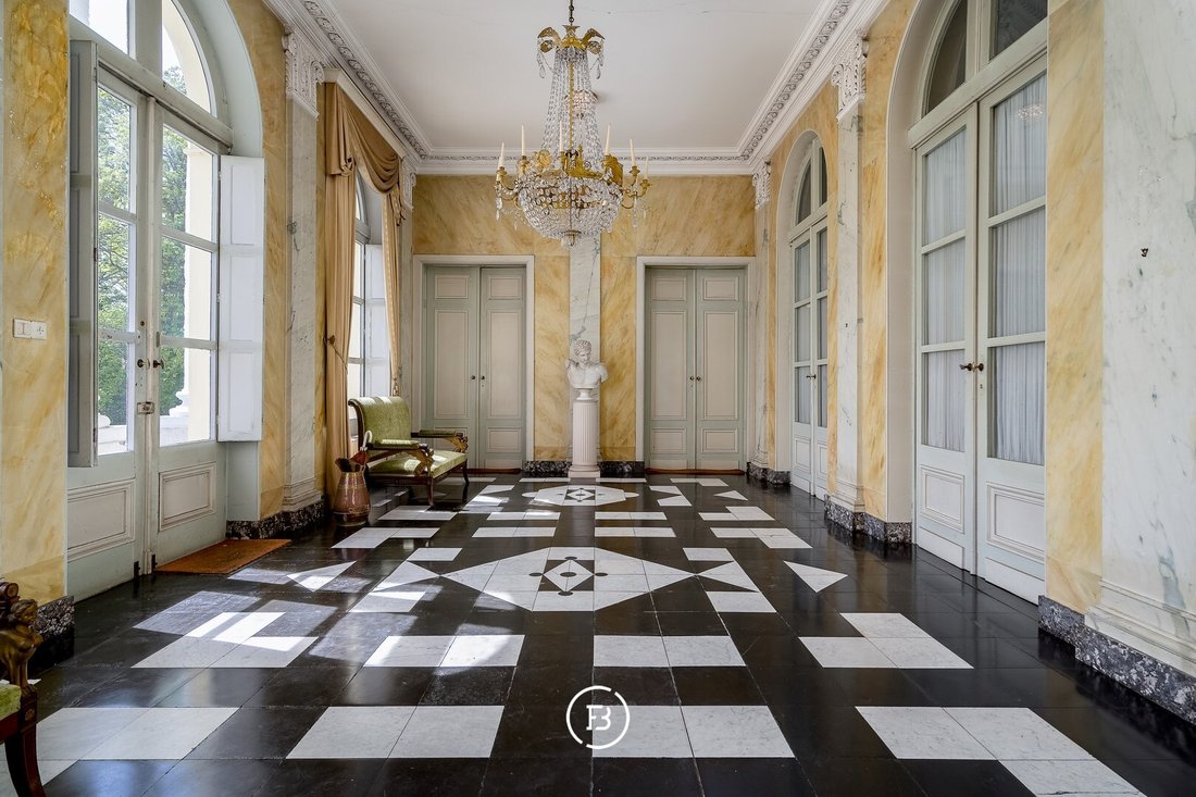 Ortegat’s Neoclassical Symphony: A Dome-Crowned Castle in Flanders’ Whispering Woods