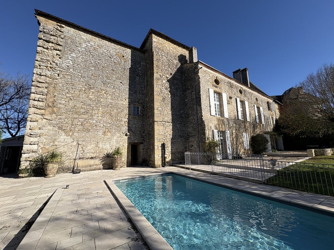 A Timeless Château’s Embrace in the Heart of Dordogne’s Golden Light