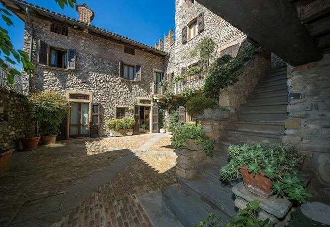 A 13th-Century Crown: Lombardy’s Restored Castle of Whispers & Light