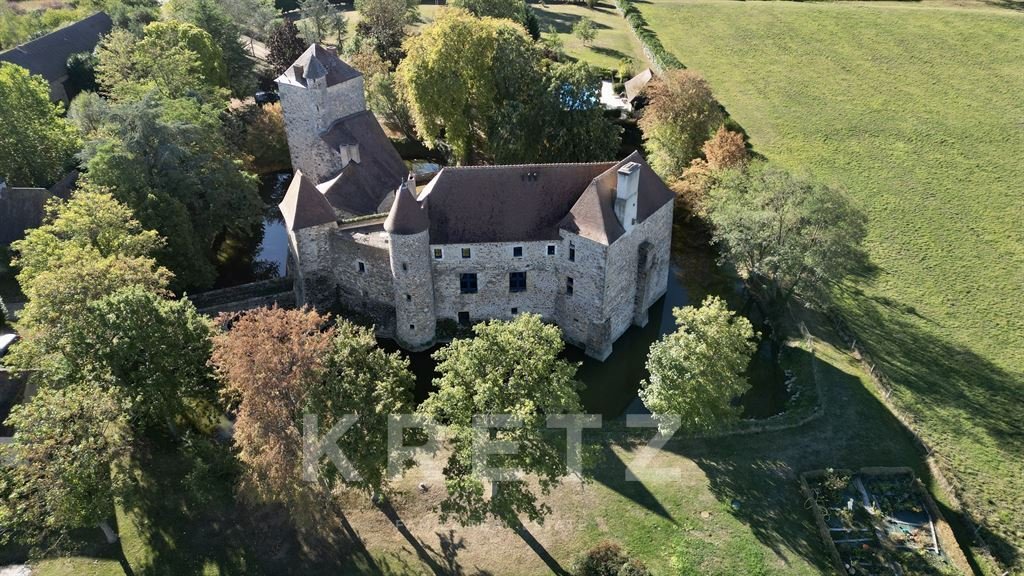 A 12th-Century Dream: Moat-Encircled Castle in Bourbonnais’ Golden Light