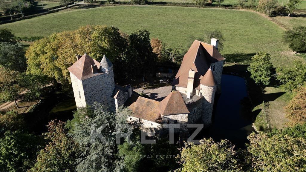 A 12th-Century Dream: Moat-Encircled Castle in Bourbonnais’ Golden Light - 5