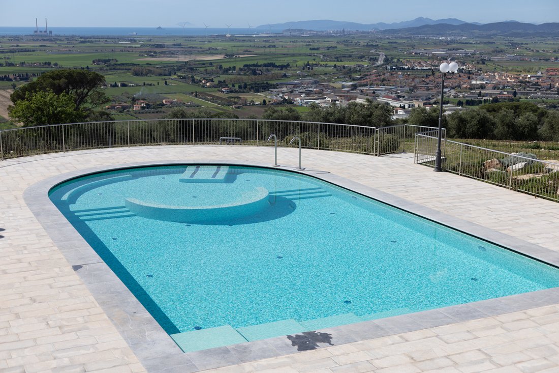 A Tuscan Crown: Where Vine-Kissed Towers Meet the Sea’s Whisper