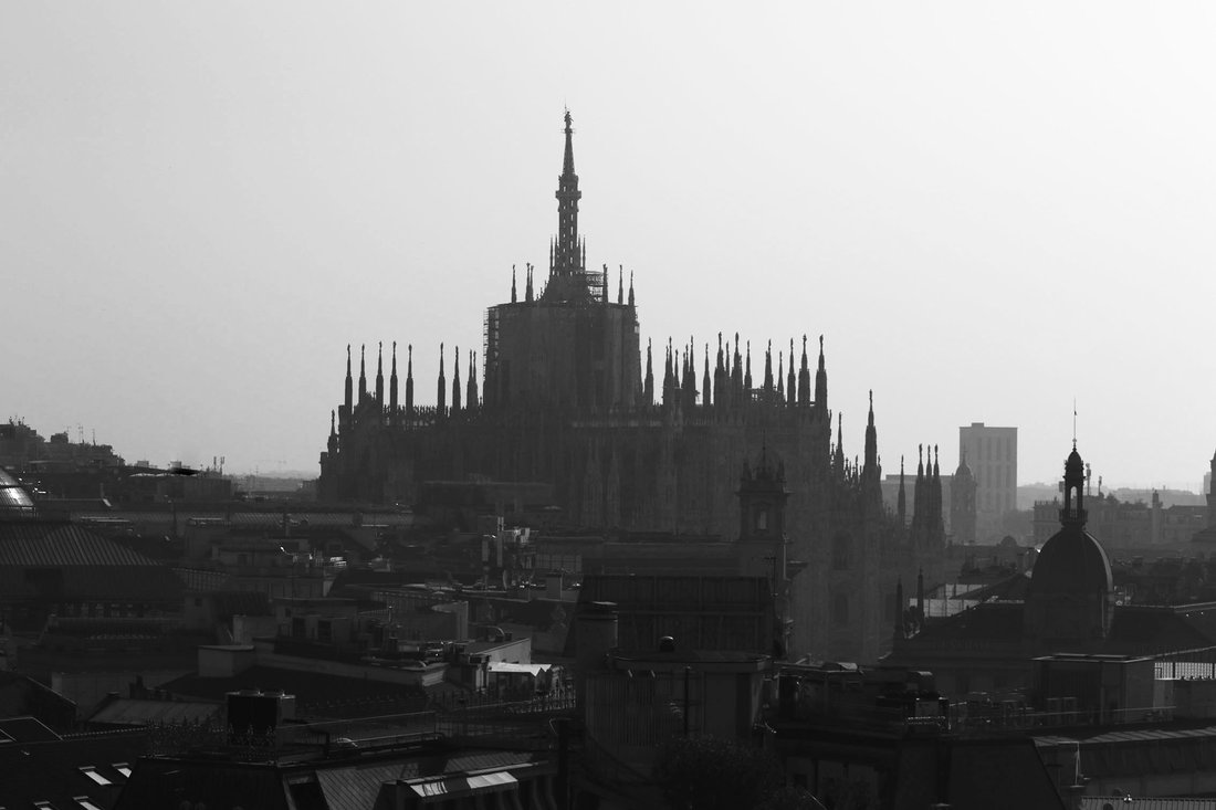 The Sforza Skyline: A Glass Jewel Crowned by Milan’s Castle Views