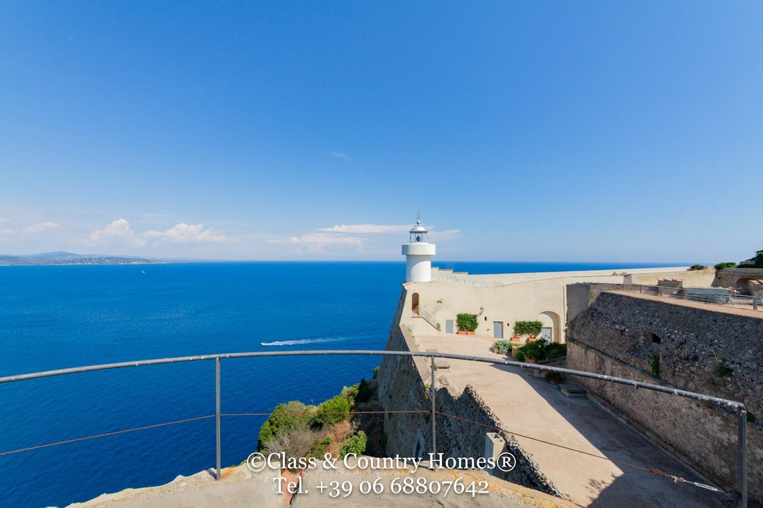 The Watchtower of Dreams: A Spanish Fortress Crown Above Tuscany’s Sapphire Sea