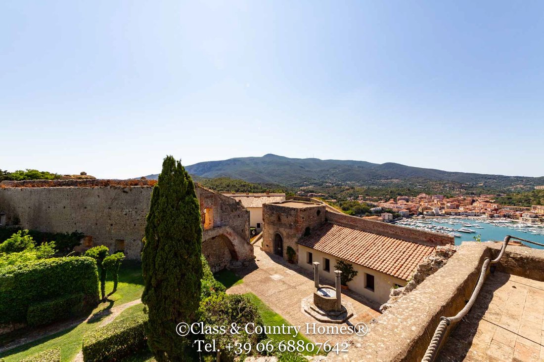 The Watchtower of Dreams: A Spanish Fortress Crown Above Tuscany’s Sapphire Sea