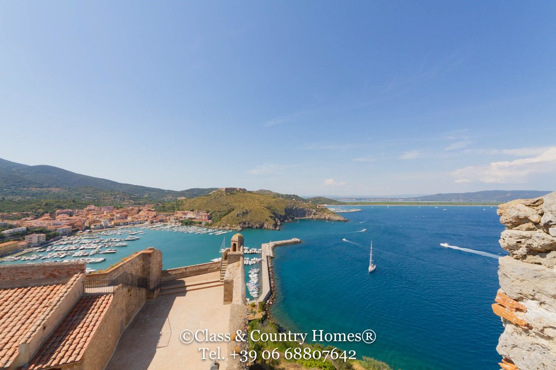 The Watchtower of Dreams: A Spanish Fortress Crown Above Tuscany’s Sapphire Sea