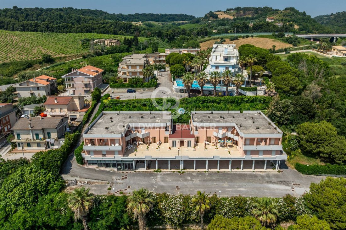 A Crown of Stone & Sea: Marche’s Coastal Castle Retreat