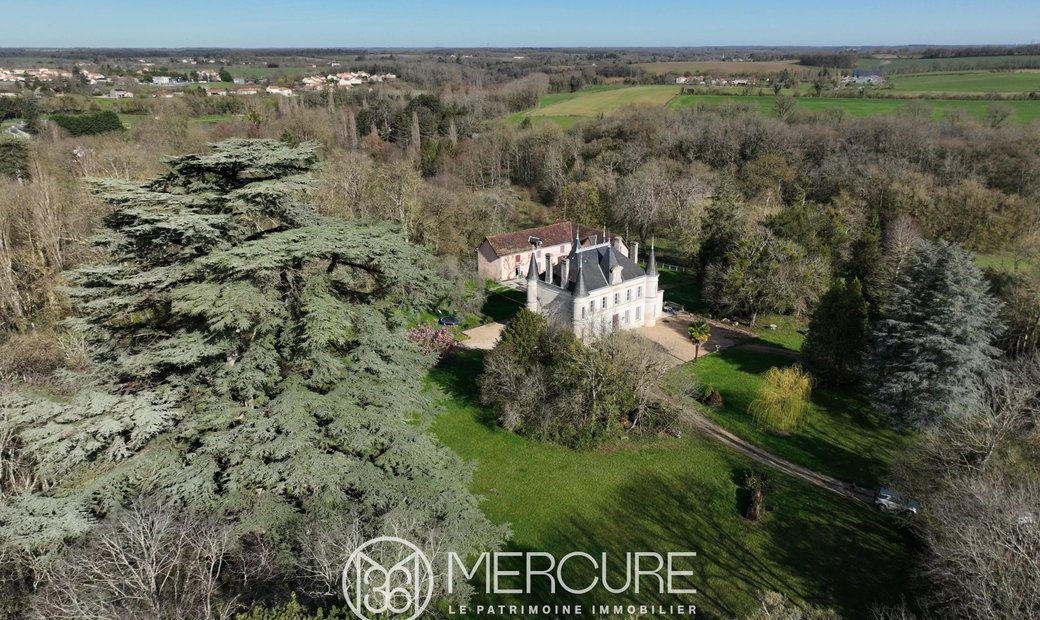 Chateau With Gite And Outbuildings Bordered By A Stream