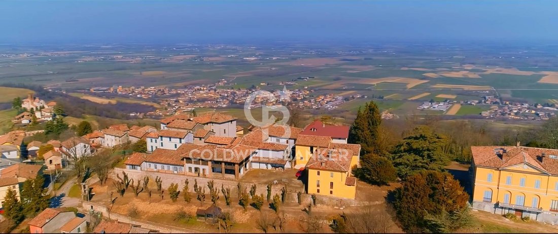 A Crown of Vineyards: Santa Giuletta’s Timeless Castle in Lombardy’s Golden Hills