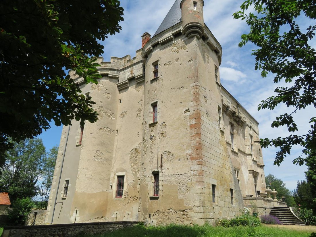 A 15th-Century Fortress of Stone & Light in Auvergne’s Golden Hills