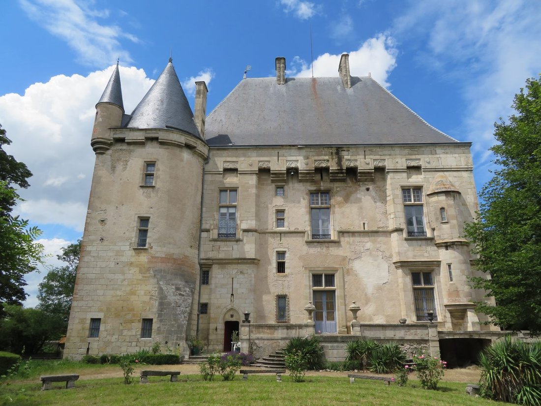 A 15th-Century Fortress of Stone & Light in Auvergne’s Golden Hills
