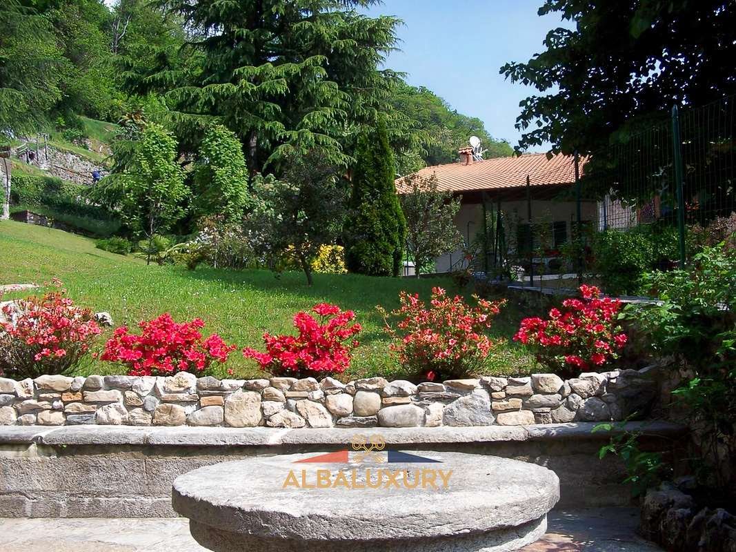 Whispers of Visconti: A 16th-Century Hunting Lodge Crowned by Wisteria & Legend