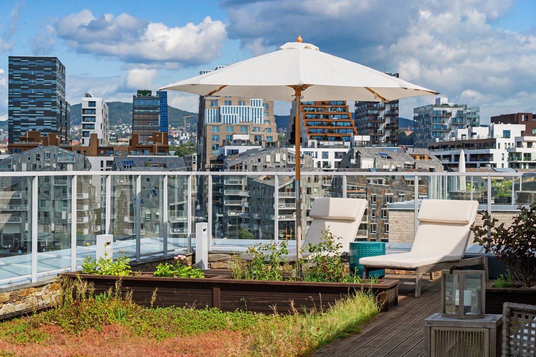 Image showcasing A Scandinavian Penthouse Apartment with Slanted Ceilings
