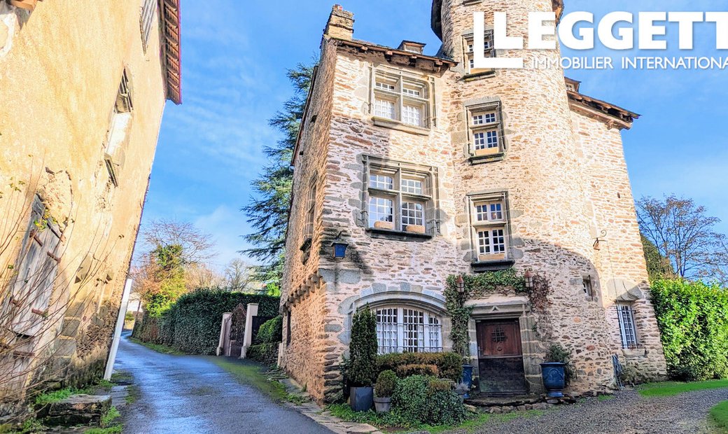 Restored 15th Century Medieval Tower On The Banks Of The Auvezère River In Ségur Le Chateau.
