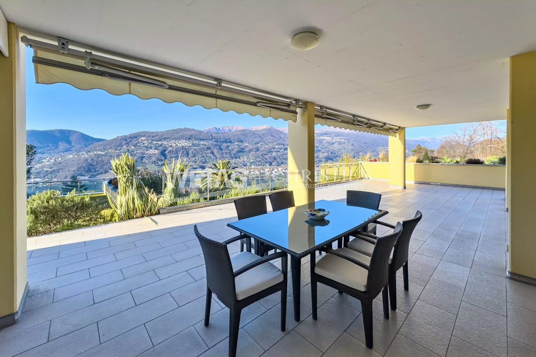 A Large Indoor Swimming Pool With A Shared Sauna Area & Panoramic View Of Lake Lugano: The Ideal Sol